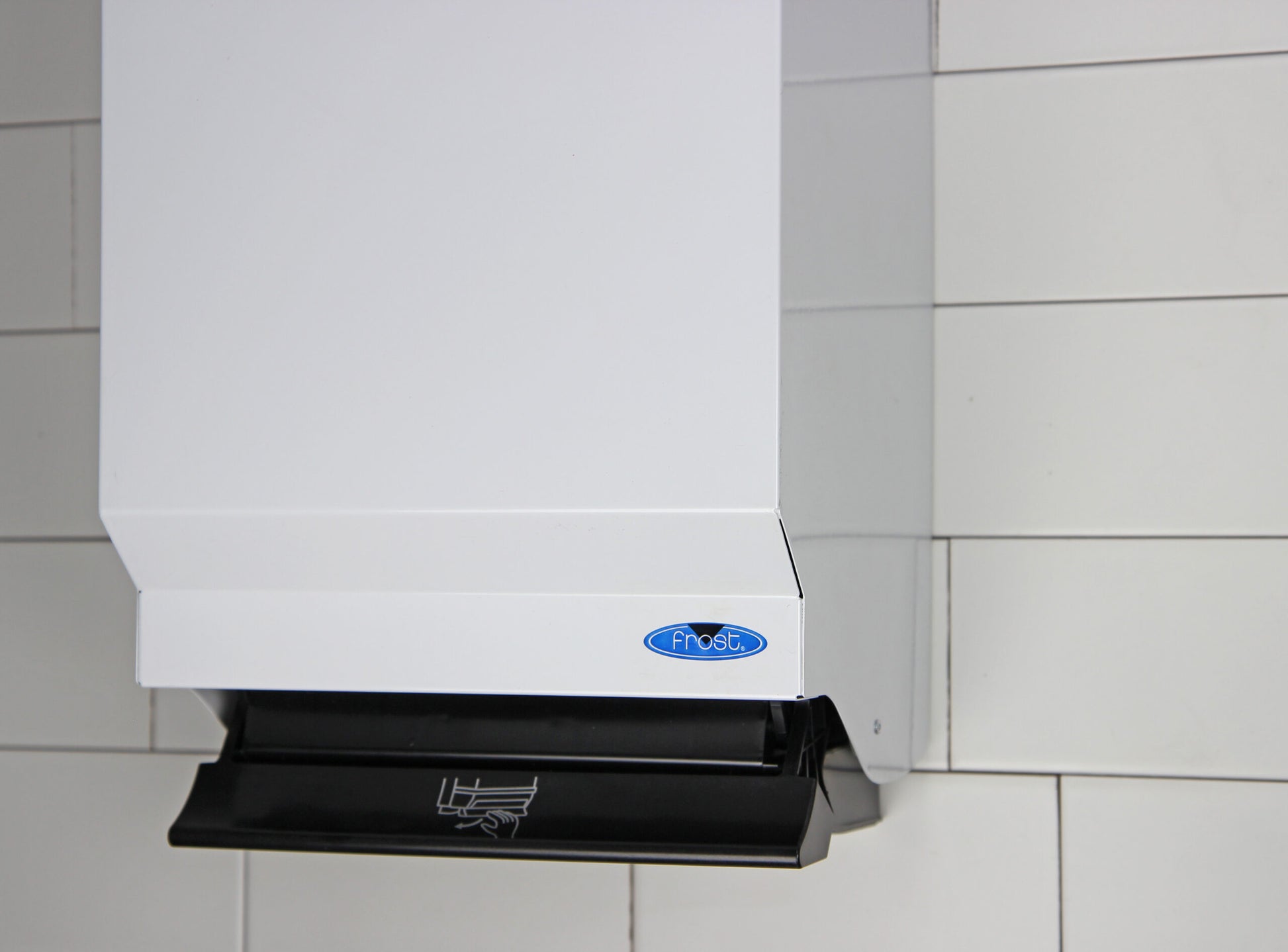 Frost White Paper Towel Dispenser In use 